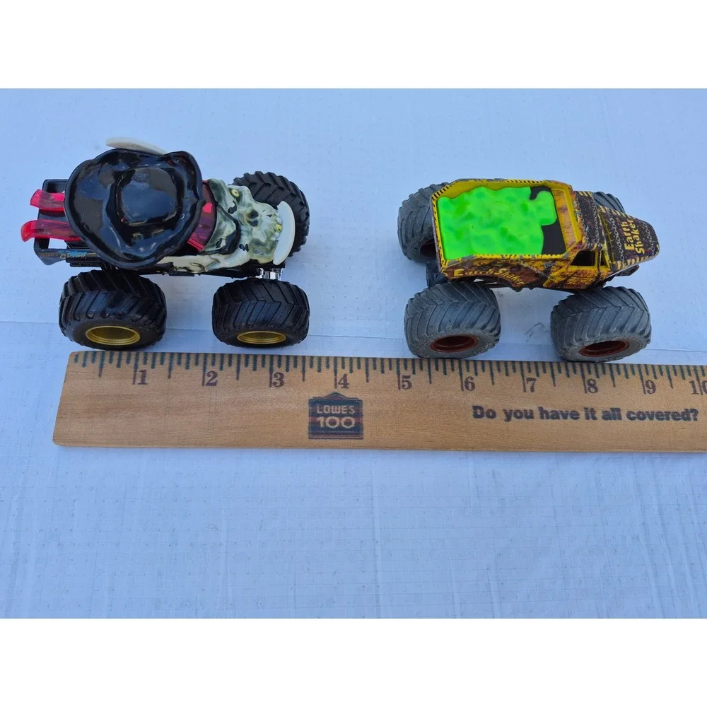 Monster Jam Pirates Curse and Zombie vs Hunter Earth Shaker Die-Cast Truck Lot